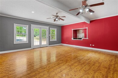 Unfurnished room featuring a textured ceiling, a c