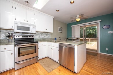 Kitchen with granite counter tops, stainless steel