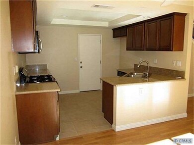 Brand New Cognac Cabinets and Sunset Gold Granite