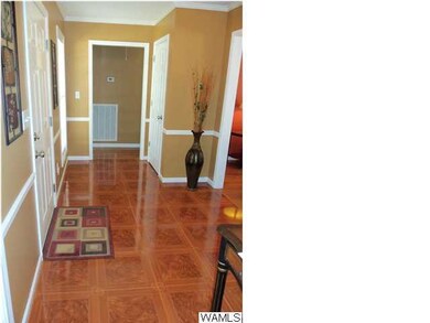 Beautifully polished hardwood floors in the entryw