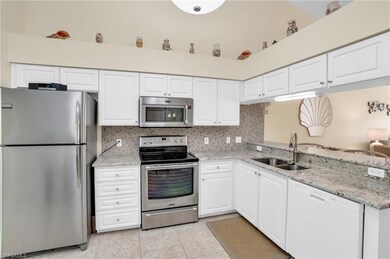 Kitchen with appliances with stainless steel finis