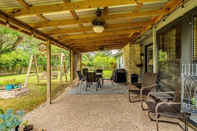 View of patio with a ceiling fan and outdoor dini