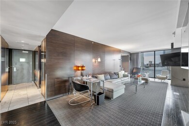 Living room with a wall of windows and wood finish