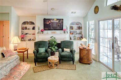 Views from the great room to a screened porch and 