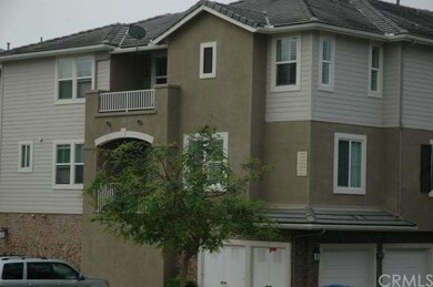 End Unit With Direct Access To Garage and Two Balc