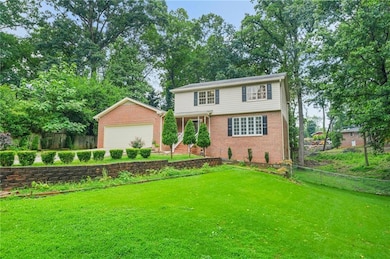 View of front of house featuring brick siding