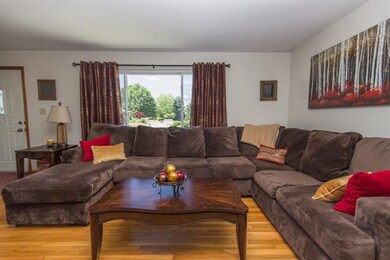 This spacious living room can accommodate all of y