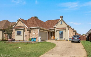 View of front of property featuring a front lawn