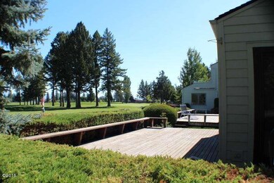 Large deck overlooks golf course