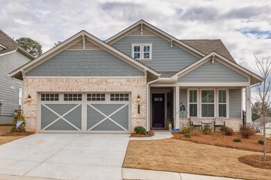 Craftsman inspired home with a garage and covered 