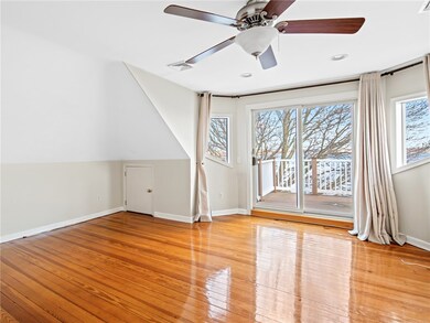 Living room with sliding glass door to balcony