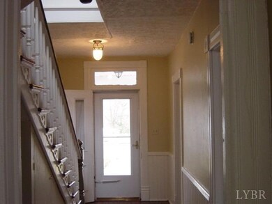 HALLWAY WITH WAINSCOTING.