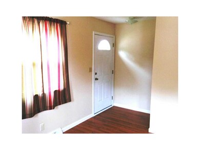 Entryway. Main floor entry. New door, new windows 