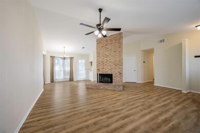 Unfurnished living room/dining room showcasing flo