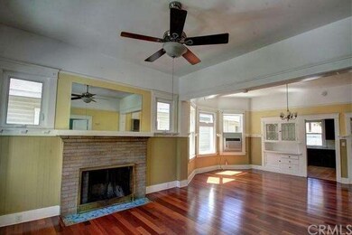 Spacious living/dining area with warm fireplace