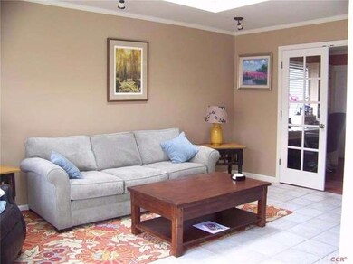 Natural light fills the living room.