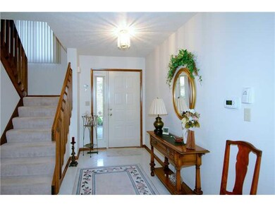 Entry/Foyer. THE ENTRYWAY FEATURES CERAMIC TILE FL