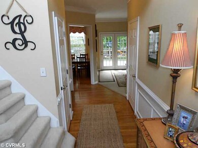 Foyer - Open two story foyer with turned stairway.