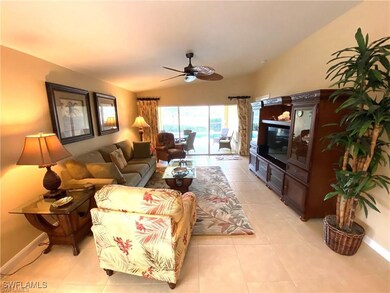 Tiled living room with ceiling fan