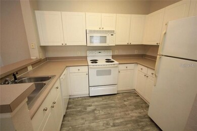 9401 Crescent Loop Cir unit 103, Tampa, FL 33619 - photo 6