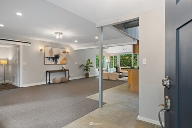 Enter to the large living area (kitchen/dining to the right, bedrooms to the left)