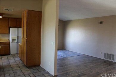 View showing more of the dining room with the tile