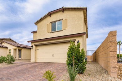 View of front of home with stucco siding, fence, d