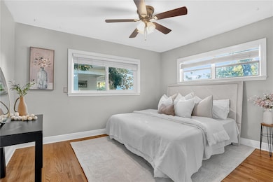 The spacious primary suite feels like a peaceful retreat after a long day.