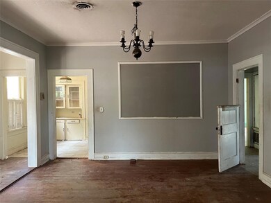 Unfurnished dining area with a notable chandelier,