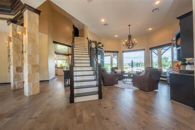 stone columns and wine room or den