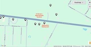 The property is situated catty-corner from Assunta's Restaurant.