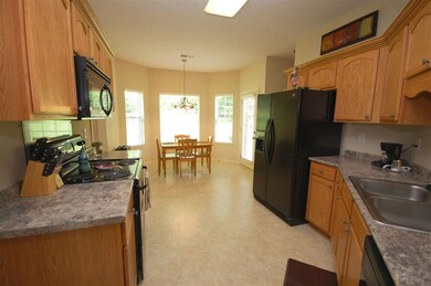 Another view of the kitchen and breakfast room!