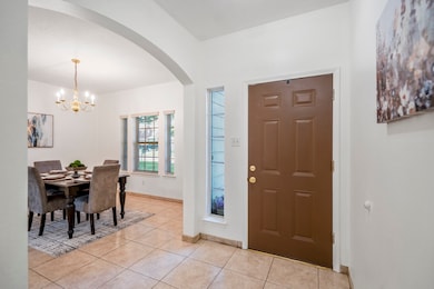 Just off the entry, the formal dining room is fram