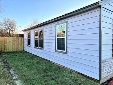 Left side of the house, vynil double pannel window