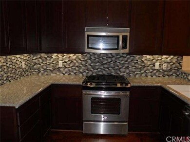 Stainless steel appliances, granite countertops an