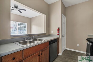 1056 Harry Hagan Rd unit 1B, Pembroke, GA 31321 - photo 6