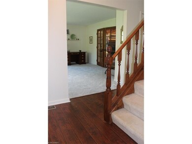 Updated Flooring in Foyer that leads to Living and
