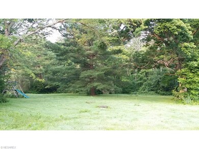 3 acre lot - beautiful mature trees - private back