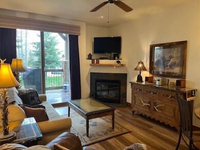 Relax in this comfy living area, enjoying the fire
