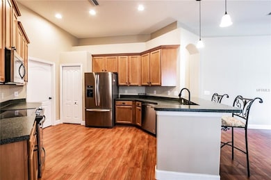 Kitchen has new sink and faucet, as well as bar sp