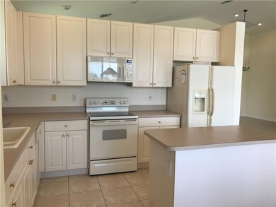 OPEN KITCHEN OVERLOOKING LAKE VIEW