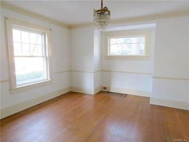 Formal Dining Room with Hardwoods * Chandelier