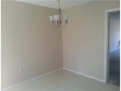 Eat in Kitchen area with new lighting fixture.