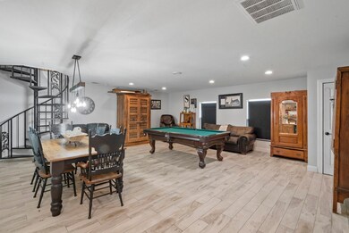 Playroom featuring light hardwood / wood-style flooring and pool table