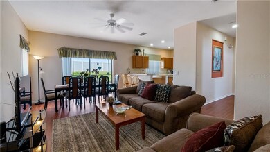 The kitchen and dining area opens to the living ro