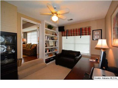 Bedroom has double French doors that open to livin