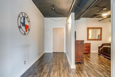 As you enter this loft style condo, you are greete
