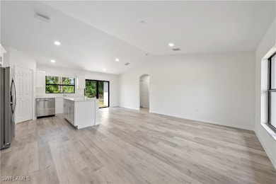 Kitchen featuring stainless steel appliances, open