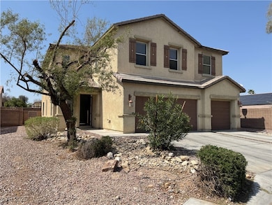 Traditional home with stucco siding, an attached g
