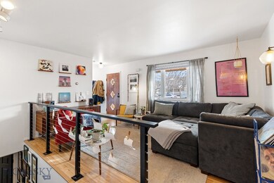 Living room with wood-style floors